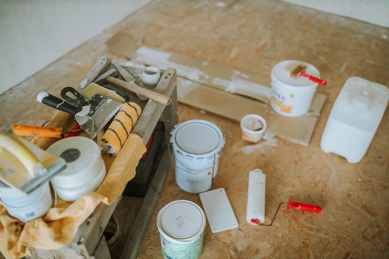 our-mission Overhead shot of tools and paint supplies for a home renovation project.